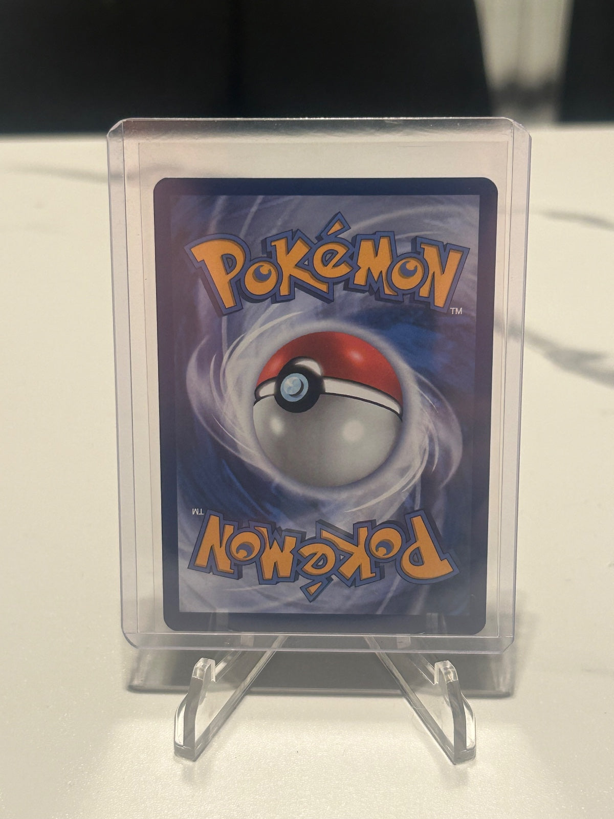 Larvitar - Holo Illustration Rare SV03: Obsidian Flames 203/197 NM (Back)
