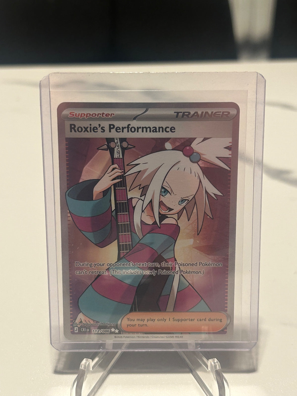 Roxie's Performance - Holo Ultra Rare ME04: Chaos Rising 112/086 NM