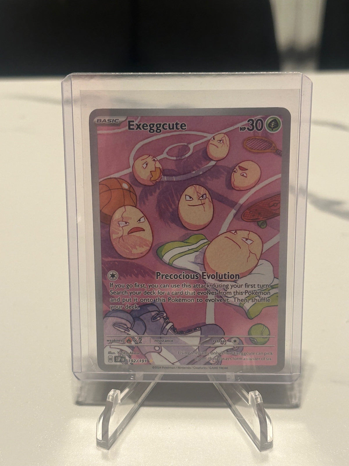 Exeggcute - Holo Illustration Rare SV08: Surging Sparks 192/191 NM
