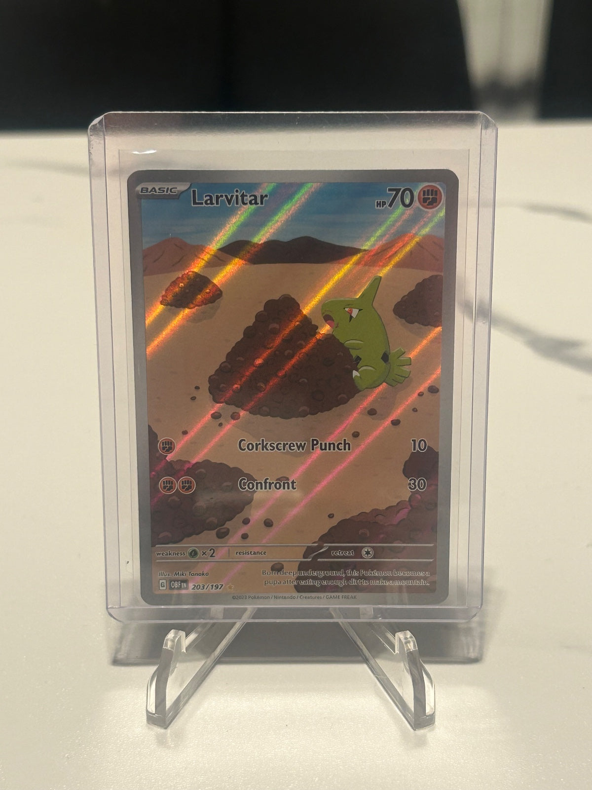 Larvitar - Holo Illustration Rare SV03: Obsidian Flames 203/197 NM