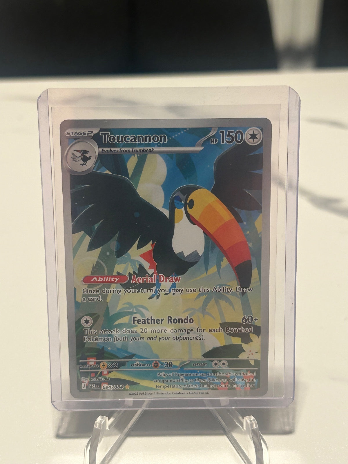 Toucannon - Holo Illustration Rare ME05: Pitch Black 094/084 NM