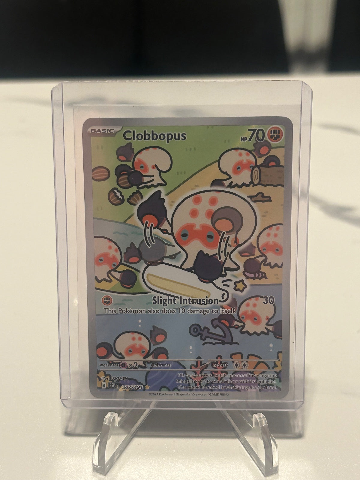 Clobbopus Holo Illustration Rare SV08: Surging Sparks 207/191 NM